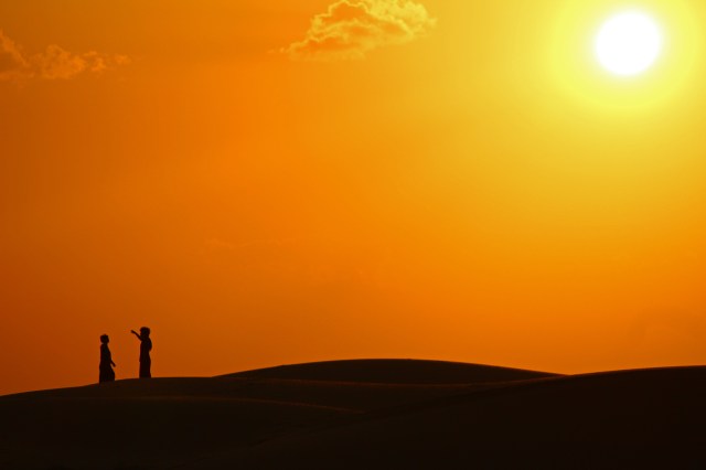 couple at dusk camel safari
